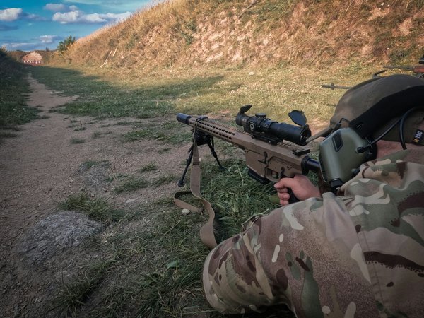 How can biathletes enhance their shooting accuracy under competitive stress?